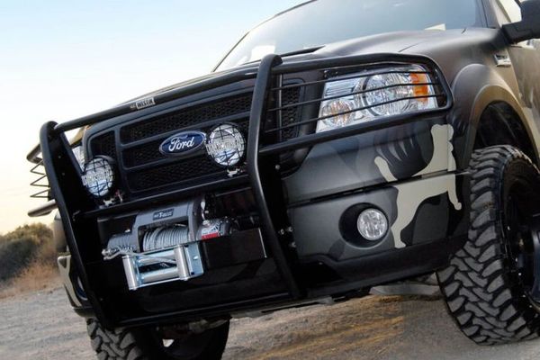 Winch mount grille guard